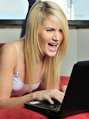 angry-blonde-girl-on-the-computer